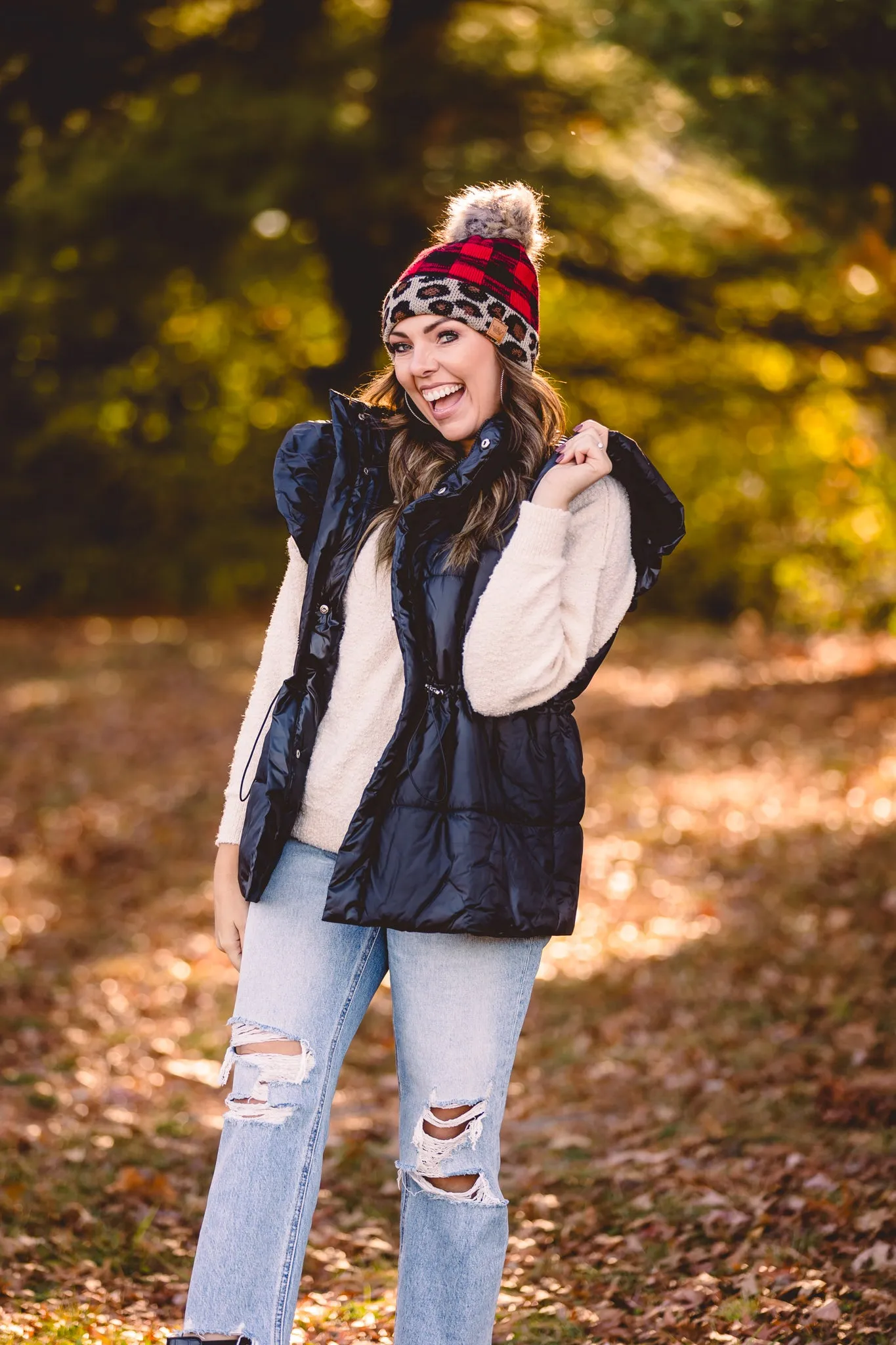 Black Puffer Vest with Shoulder Ruffle Detail