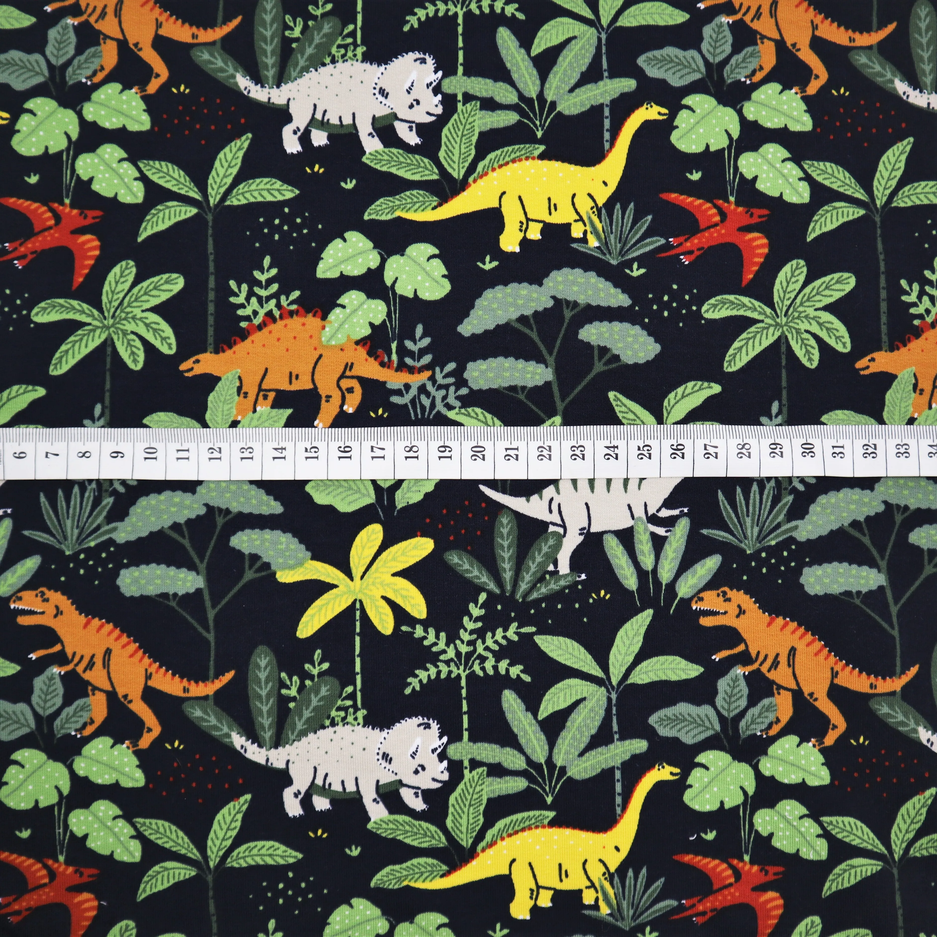 End of Roll Rem Organic French Terry in Navy Dinosaur Print