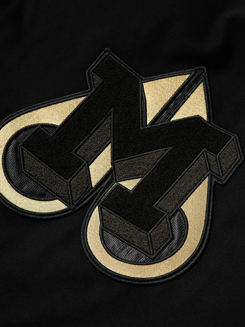 MOOSE KNUCKLES - EMBROIDERED PATCH VARSITY JACKET