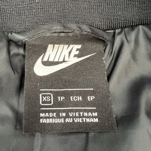 Nike Women’s satin black with gold chain bomber jacket size XS