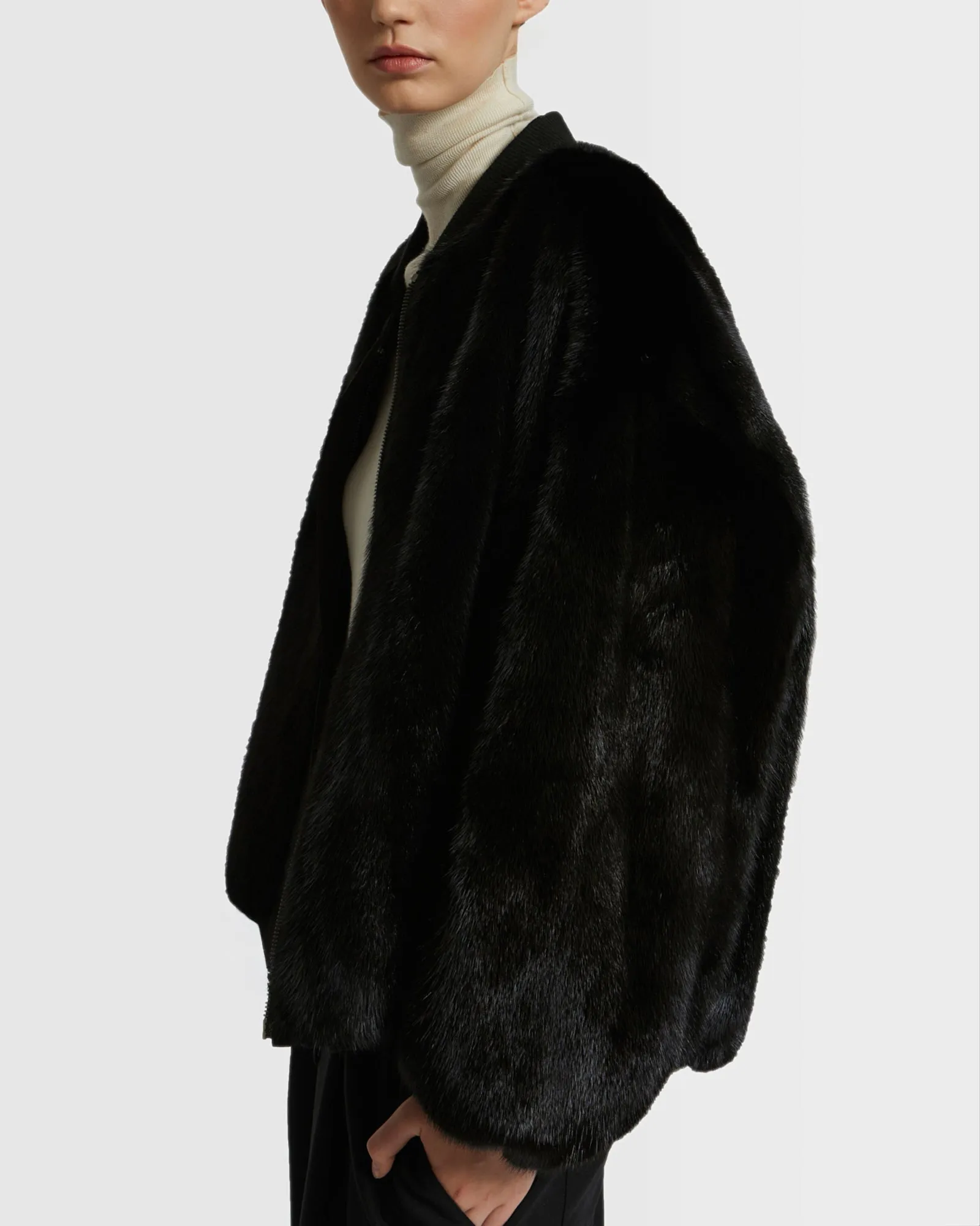 Reversible bomber jacket in water-repellent technical fabric and long-haired mink