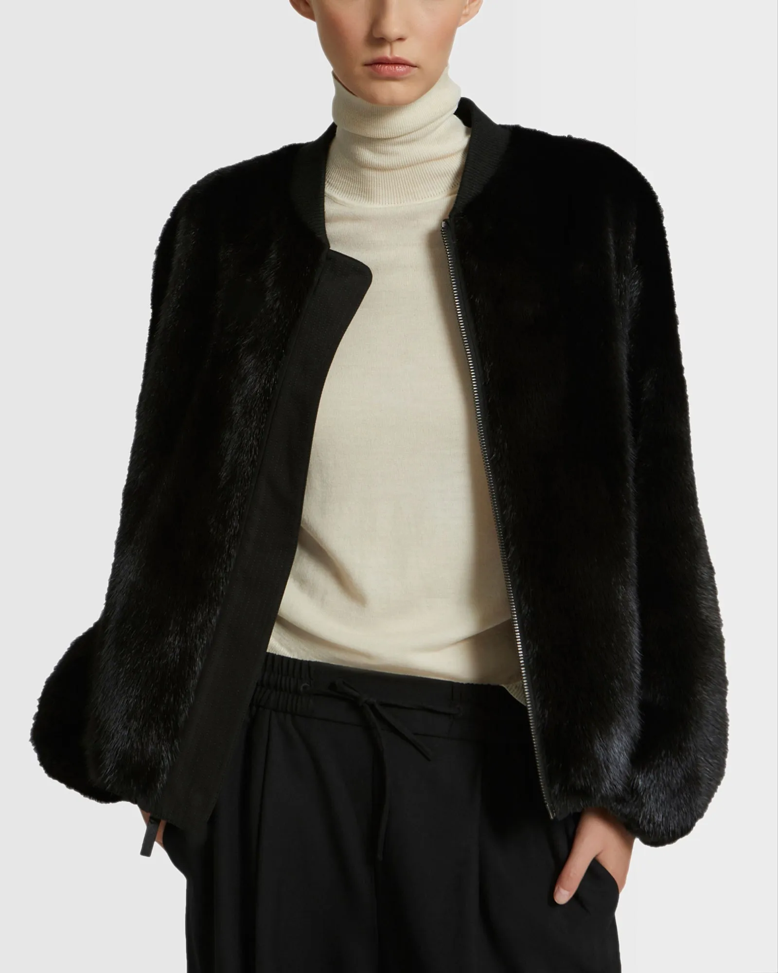 Reversible bomber jacket in water-repellent technical fabric and long-haired mink