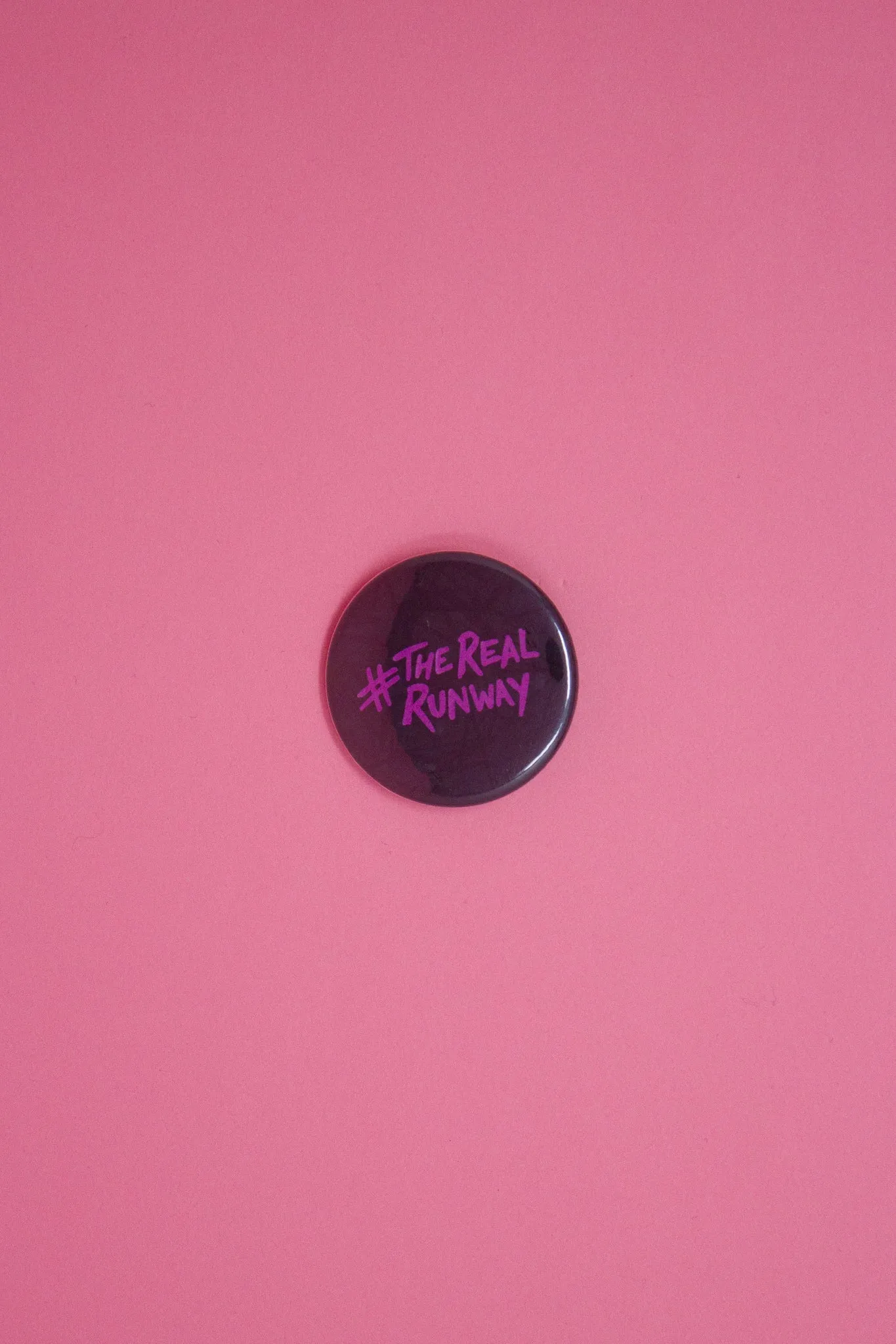 #therealrunway Button